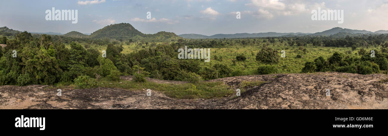 Panorama shot on the edge of the Minneriya National Park in Sri Lanka. Showing the jungle, forest, mountains in the park Stock Photo