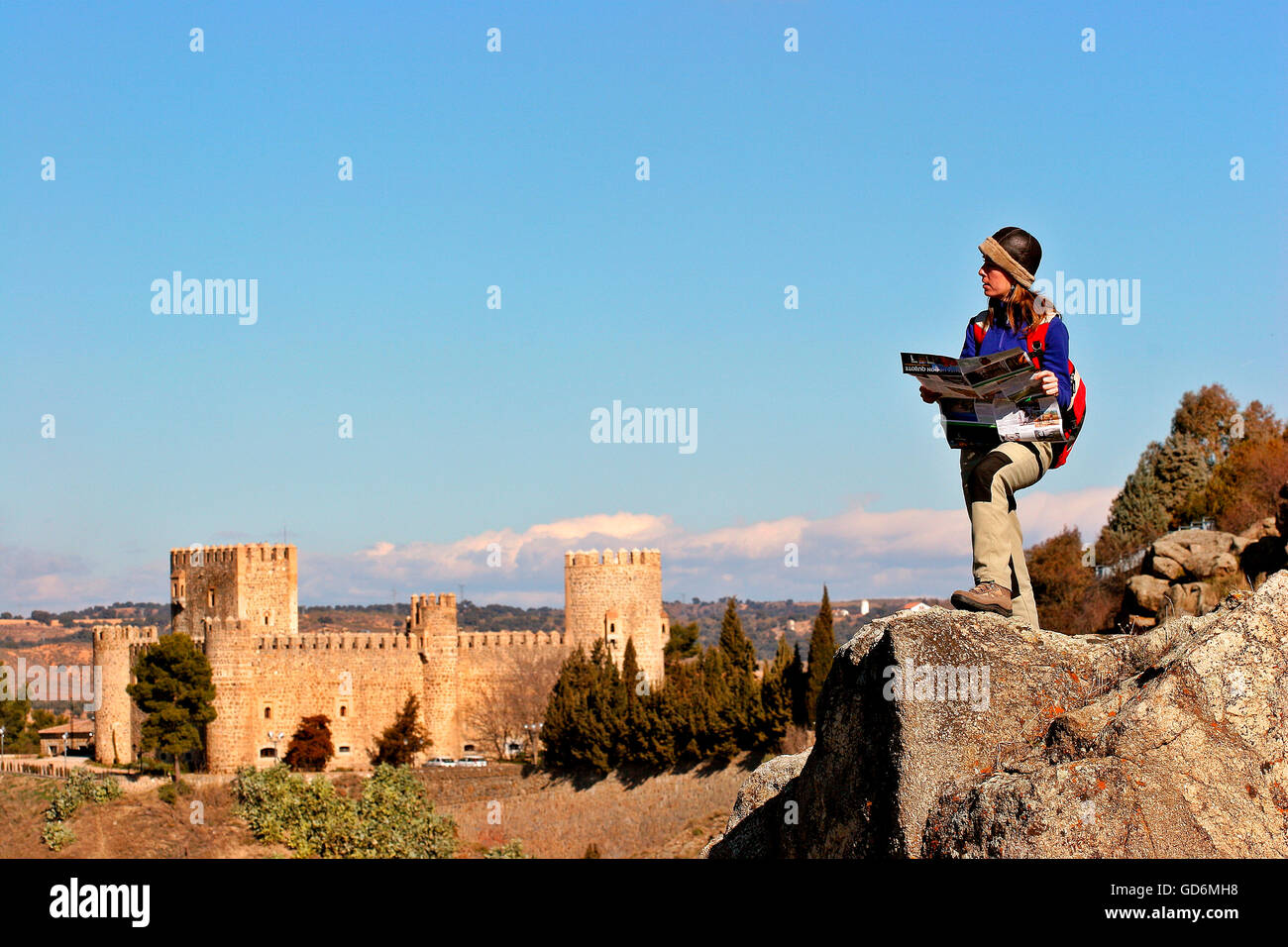 Panoramic view of the city of Toledo and the Tagus River. Castilla La Mancha. Spain. Woman doing the route of Don Quijote Stock Photo