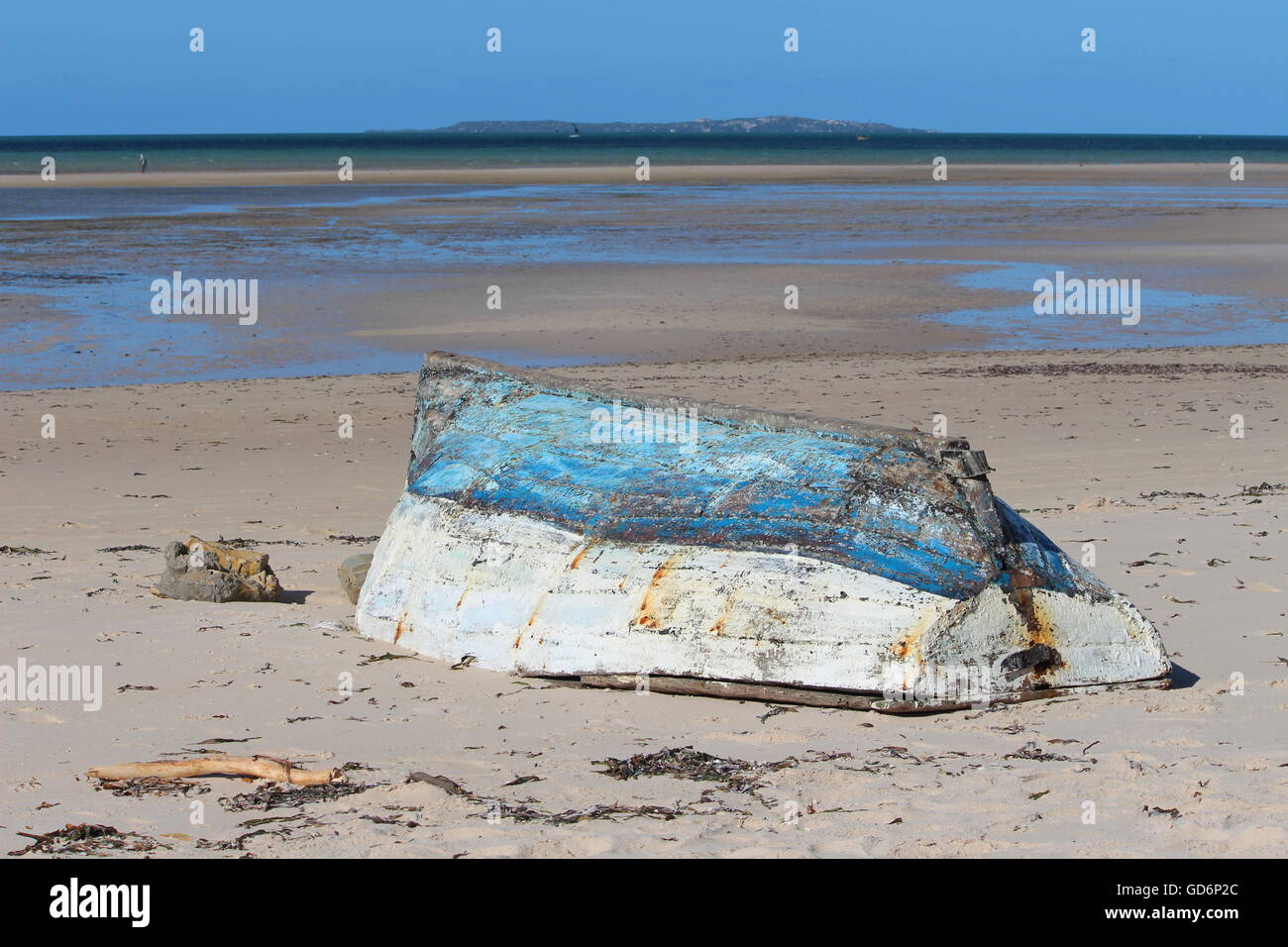 Old blue and white fishing boat at the beach of Vilankulo Stock Photo ...