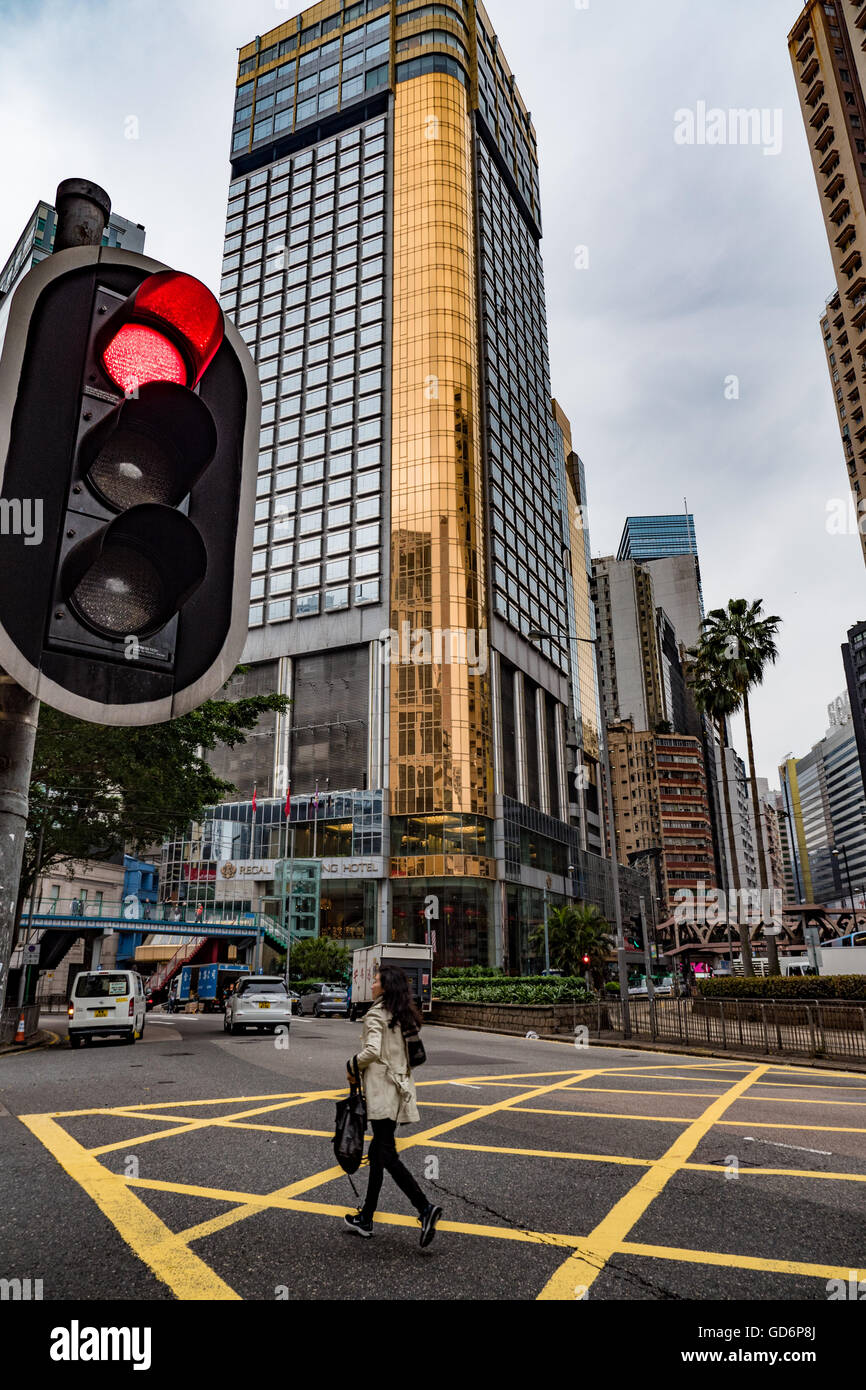 Road junction and traffic lights at the junction of Causeway Road and Tung lo Wan Road showing the Regal Hotel Hong Kong, China Stock Photo