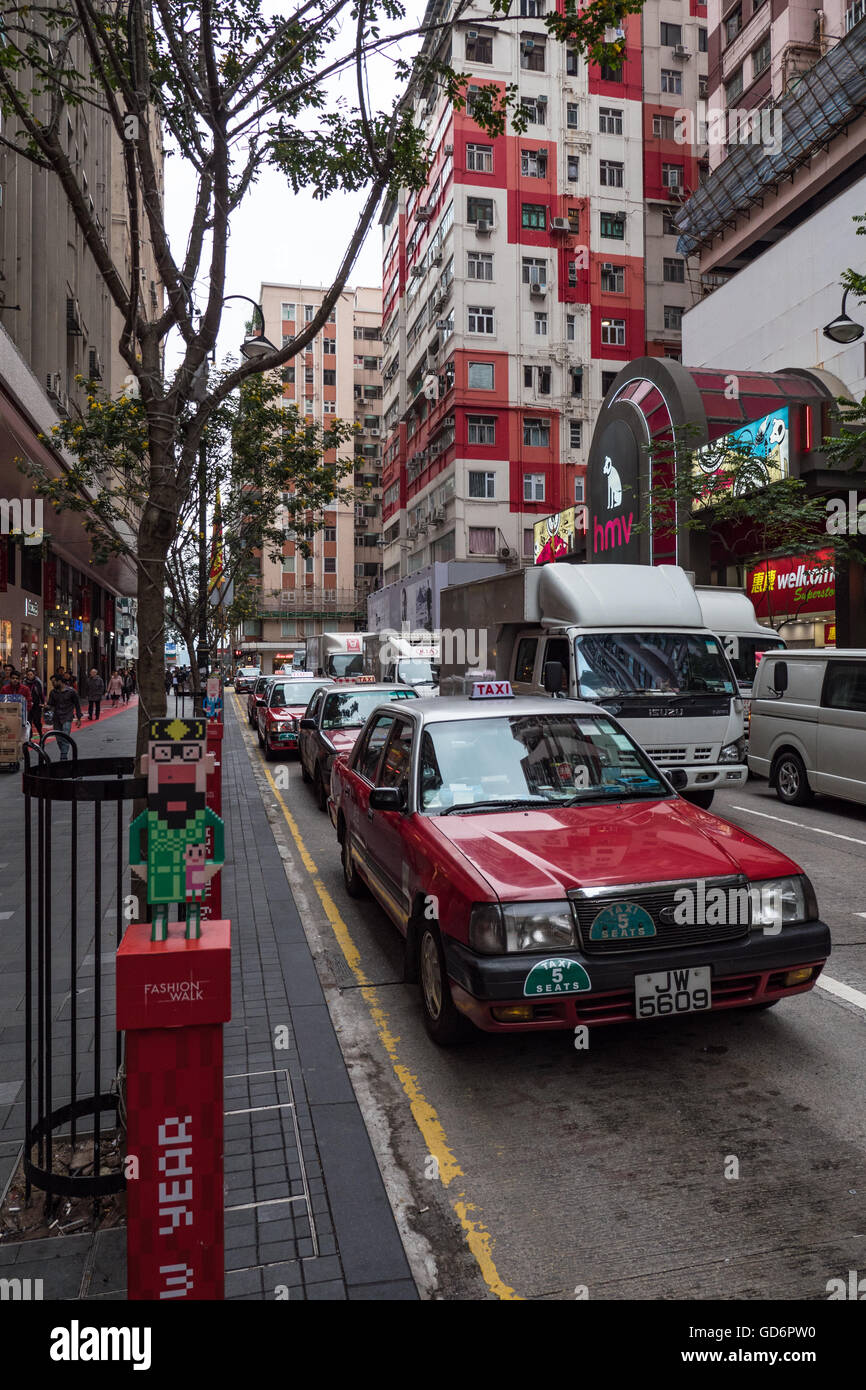 Taxis in Patterson Street taxi rank, Hong Kong Stock Photo