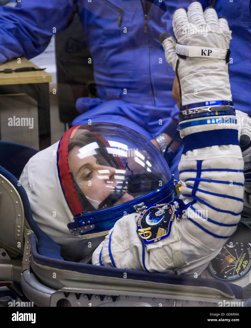 International Space Station Expedition 48 American astronaut Kate Rubins is suited up in her Russian Sokol launch and entry suit in preparation for launch July 7, 2016 at the Baikonur Cosmodrome in Kazakhstan. Rubens joins crew members Russian cosmonaut Anatoly Ivanishin and Japanese astronaut Takuya Onishi on four-month mission. Stock Photo