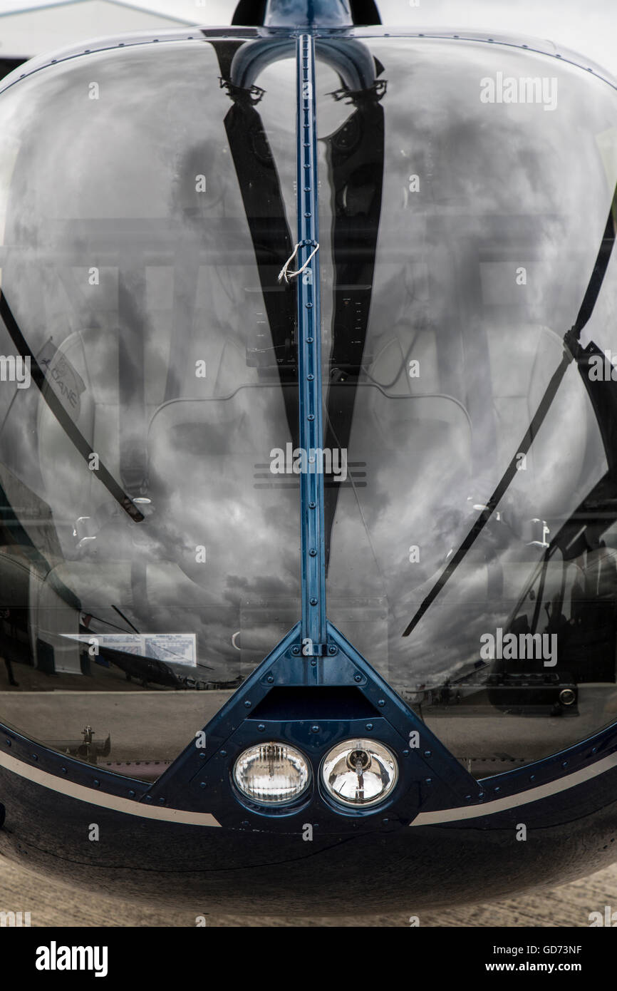 Head on view of the cockpit of a Robinson helicopter. Stock Photo