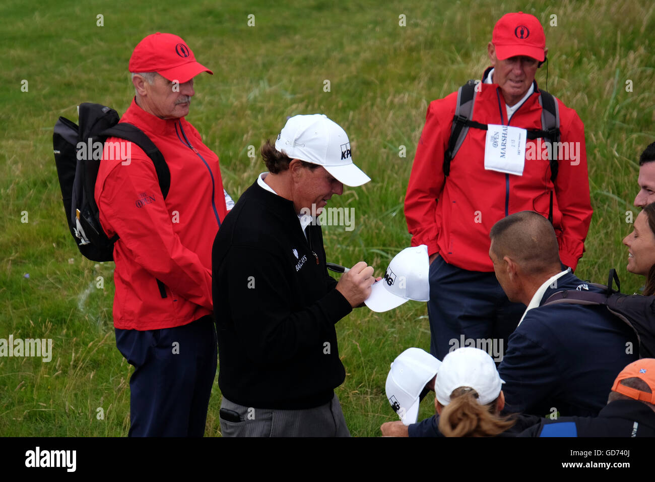 Phil Mickelson signs autographs at Monday practice day at the 2016 British Open golf championship. Stock Photo