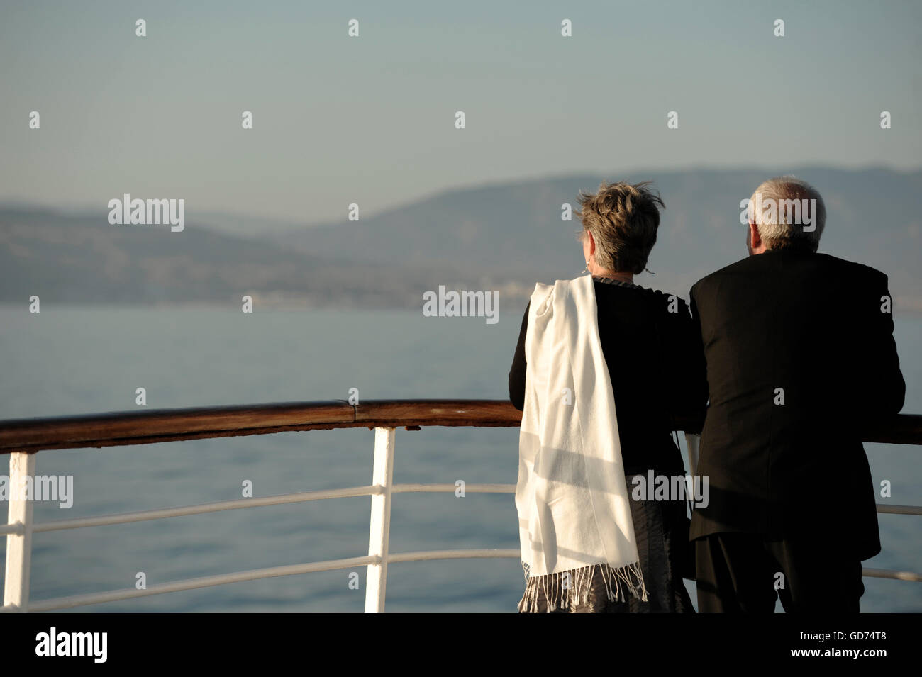 Older couple on the deck of a cruise ship Stock Photo