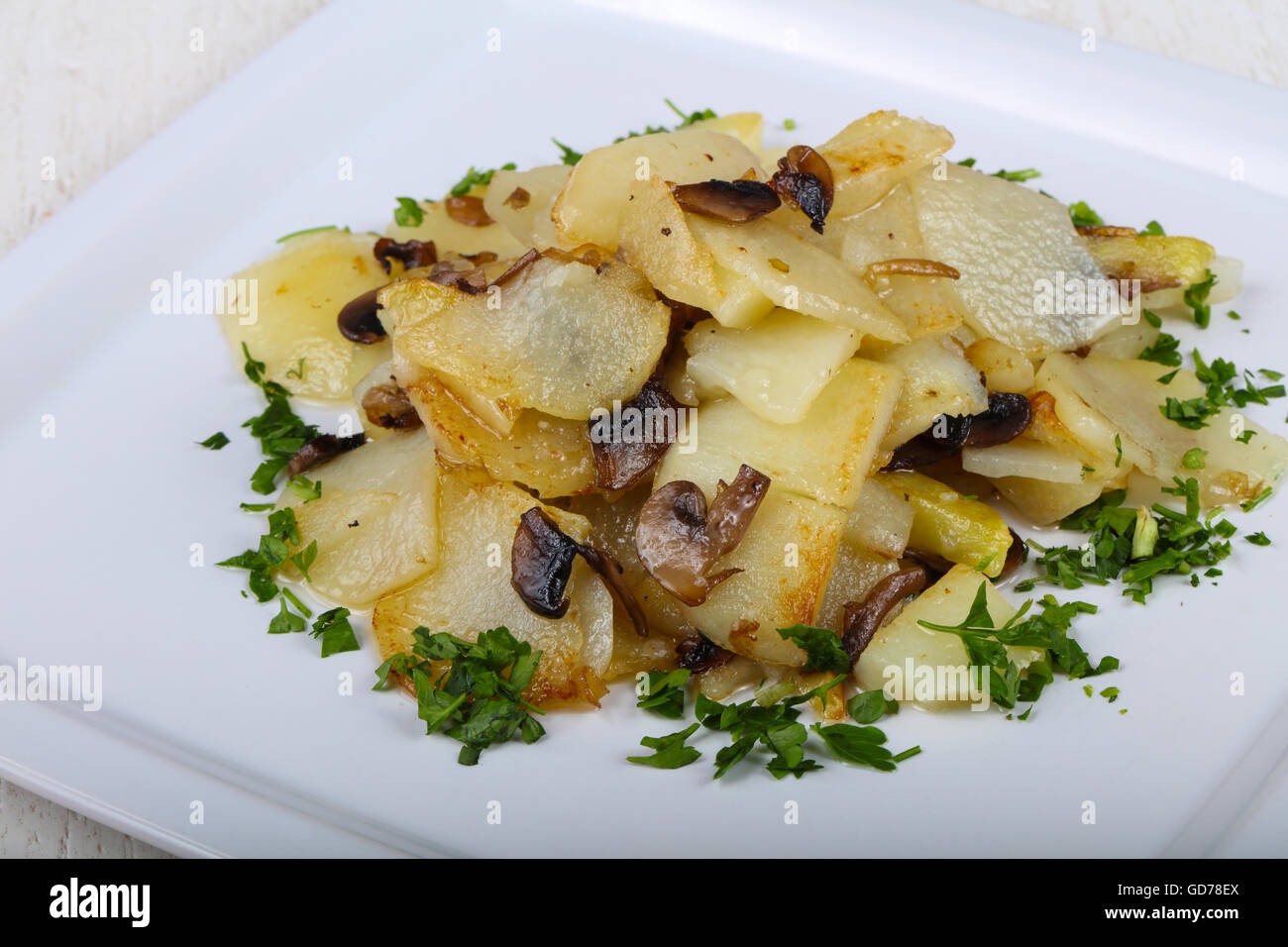 Roasted potato with dill and parsley Stock Photo Alamy