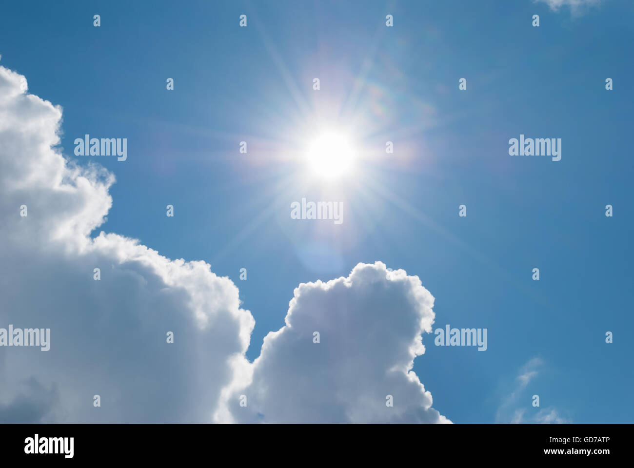 Sun comes out from under the clouds. Heavenly landscape. Stock Photo