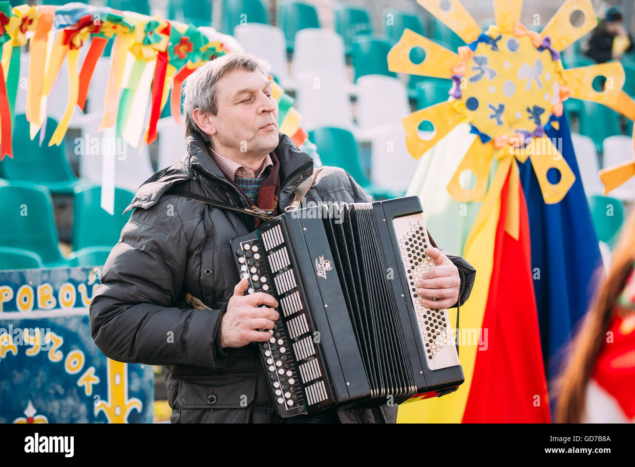 Gomel, Belarus - March 12, 2016: Unknown man plays the accordion folk