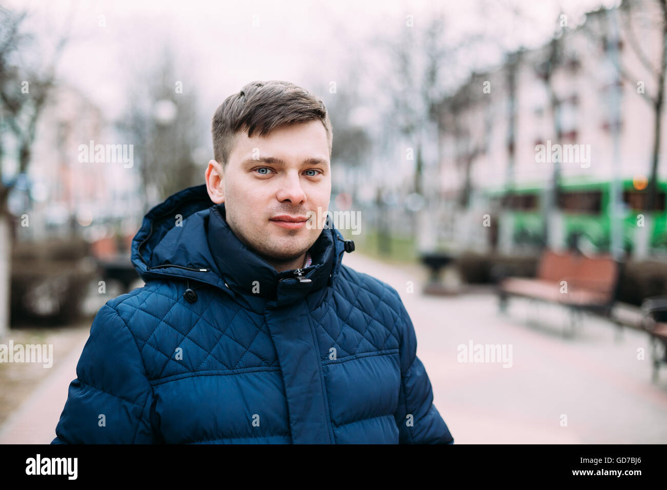 Man in light blue jacket hi-res stock photography and images - Alamy