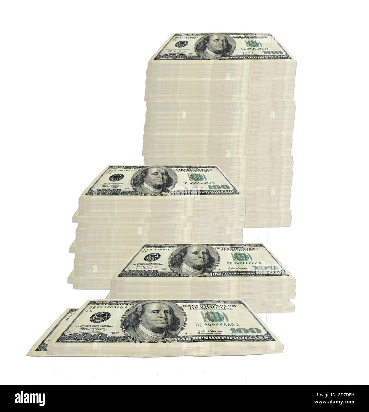 concept image of 100 hundred dollar bills stacked in various groupings of different heights Stock Photo