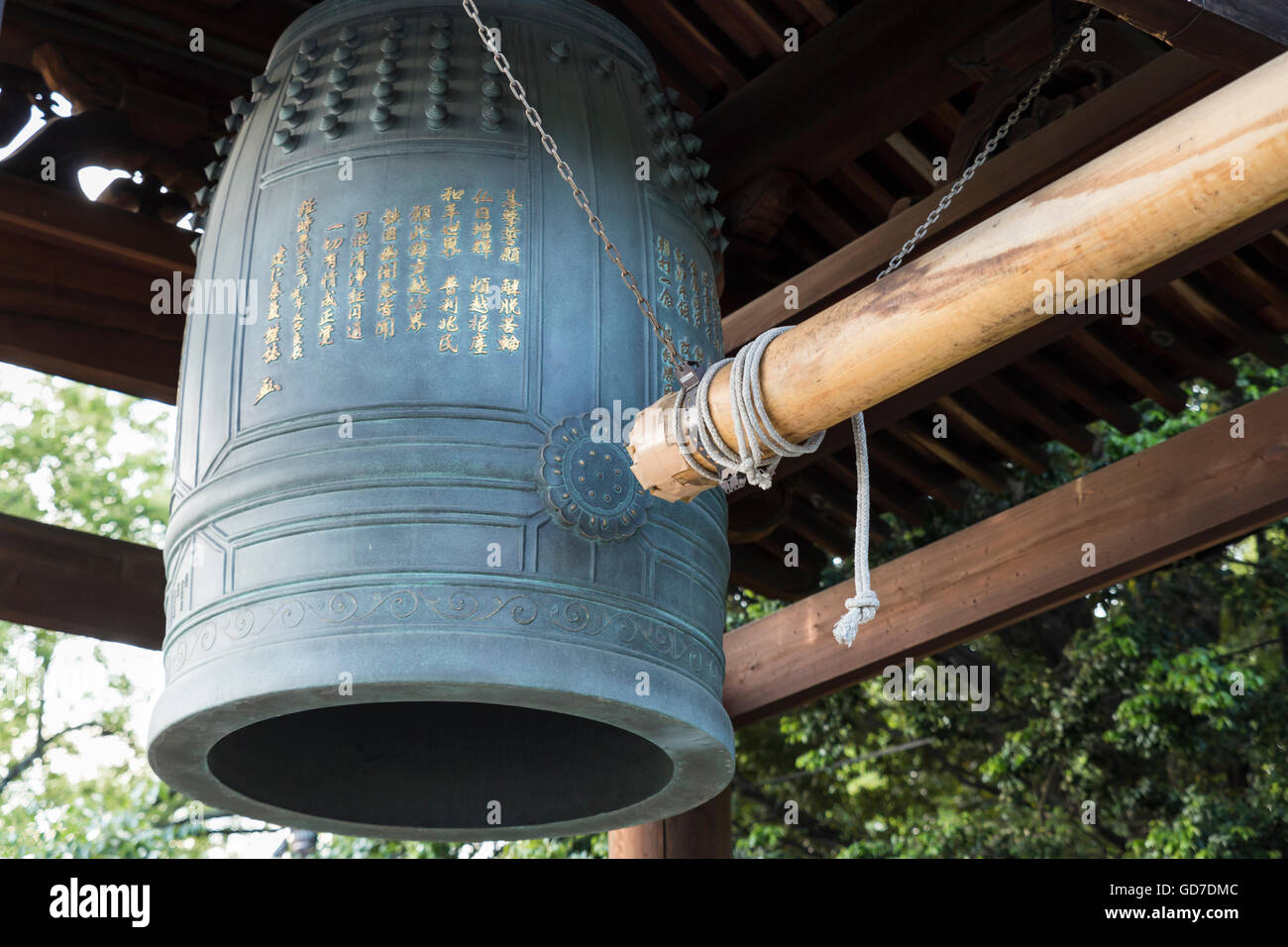 A big Japanese temple bell with golden letters at the kodaiji temple