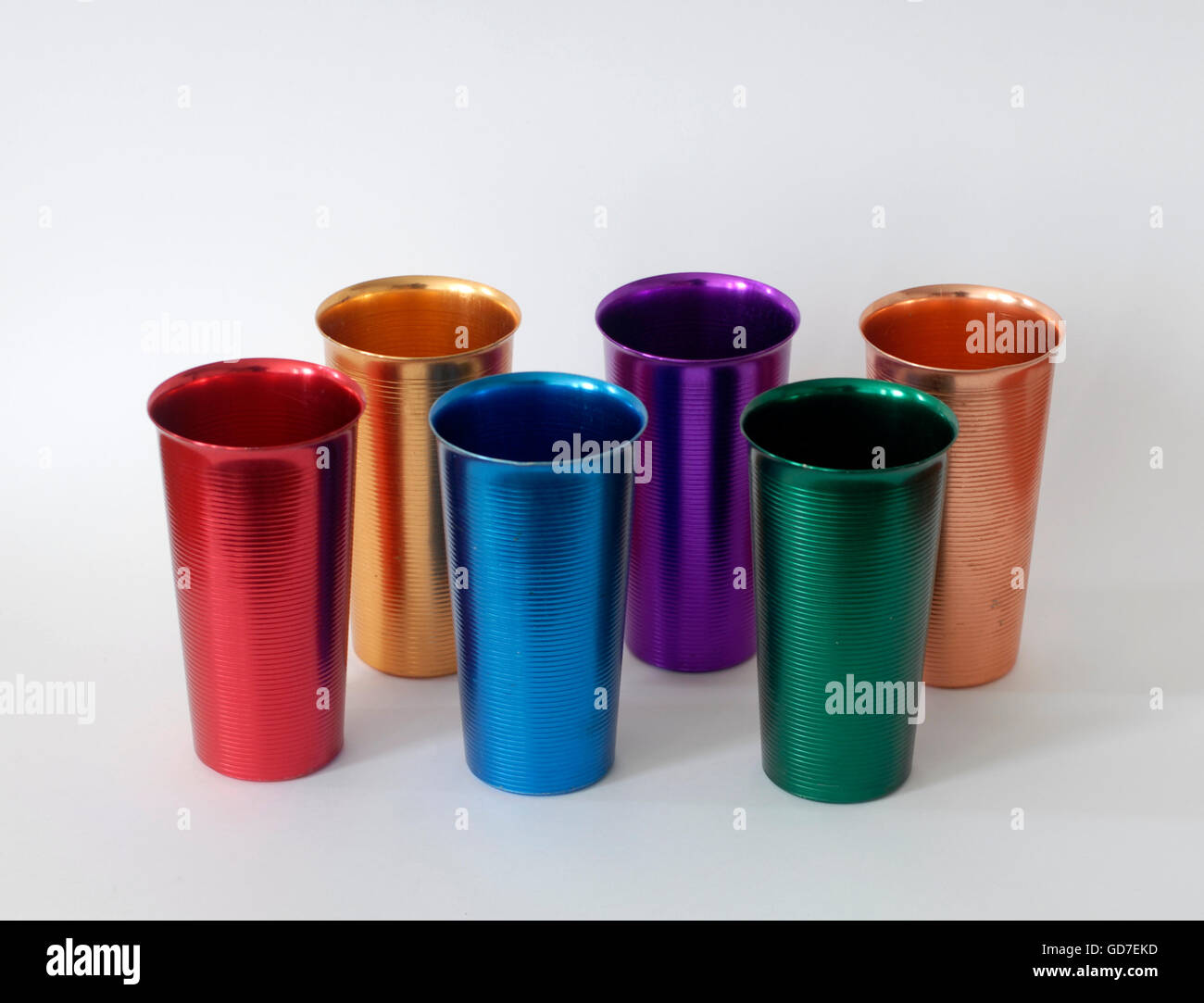 Six anodized aluminum glasses or cups. Different colors. Made in Italy  Stock Photo - Alamy