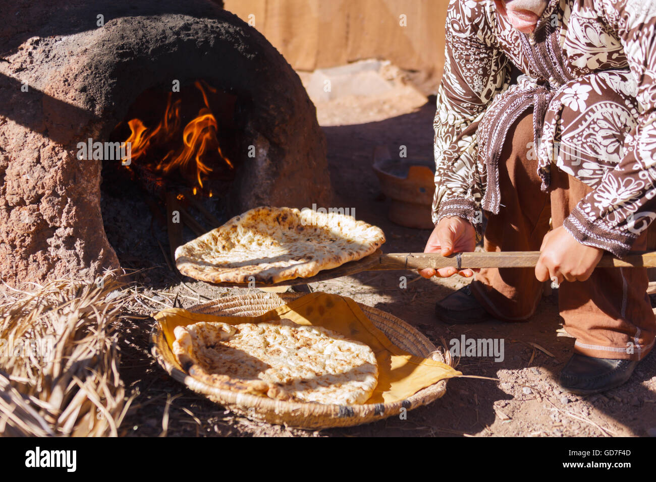 A woman prepares traditional Moroccan bread. Stock Photo