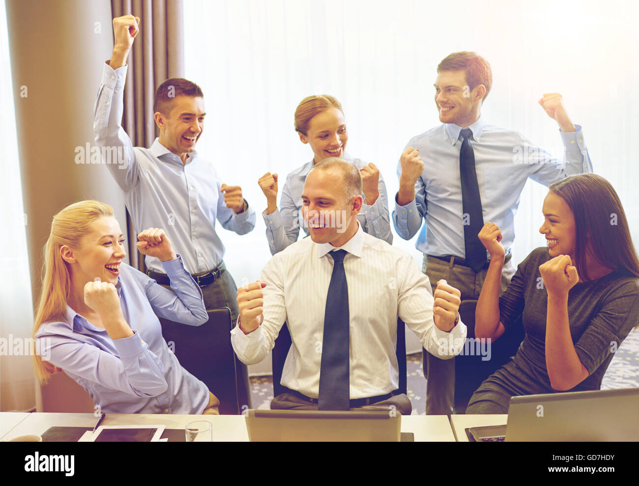 business people celebrating victory in office Stock Photo - Alamy