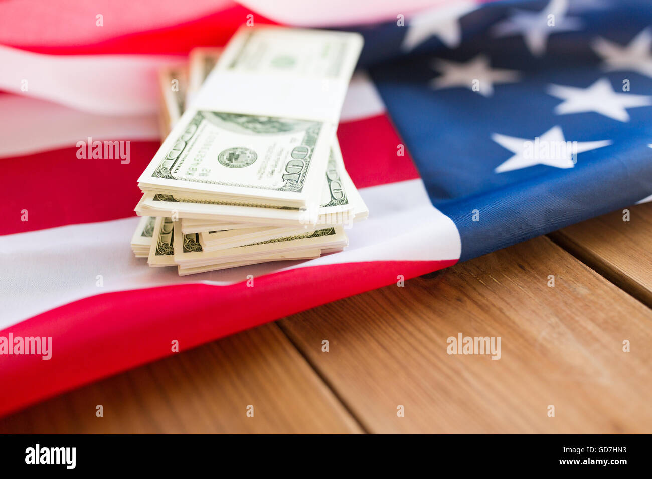 close up of american flag and dollar cash money Stock Photo