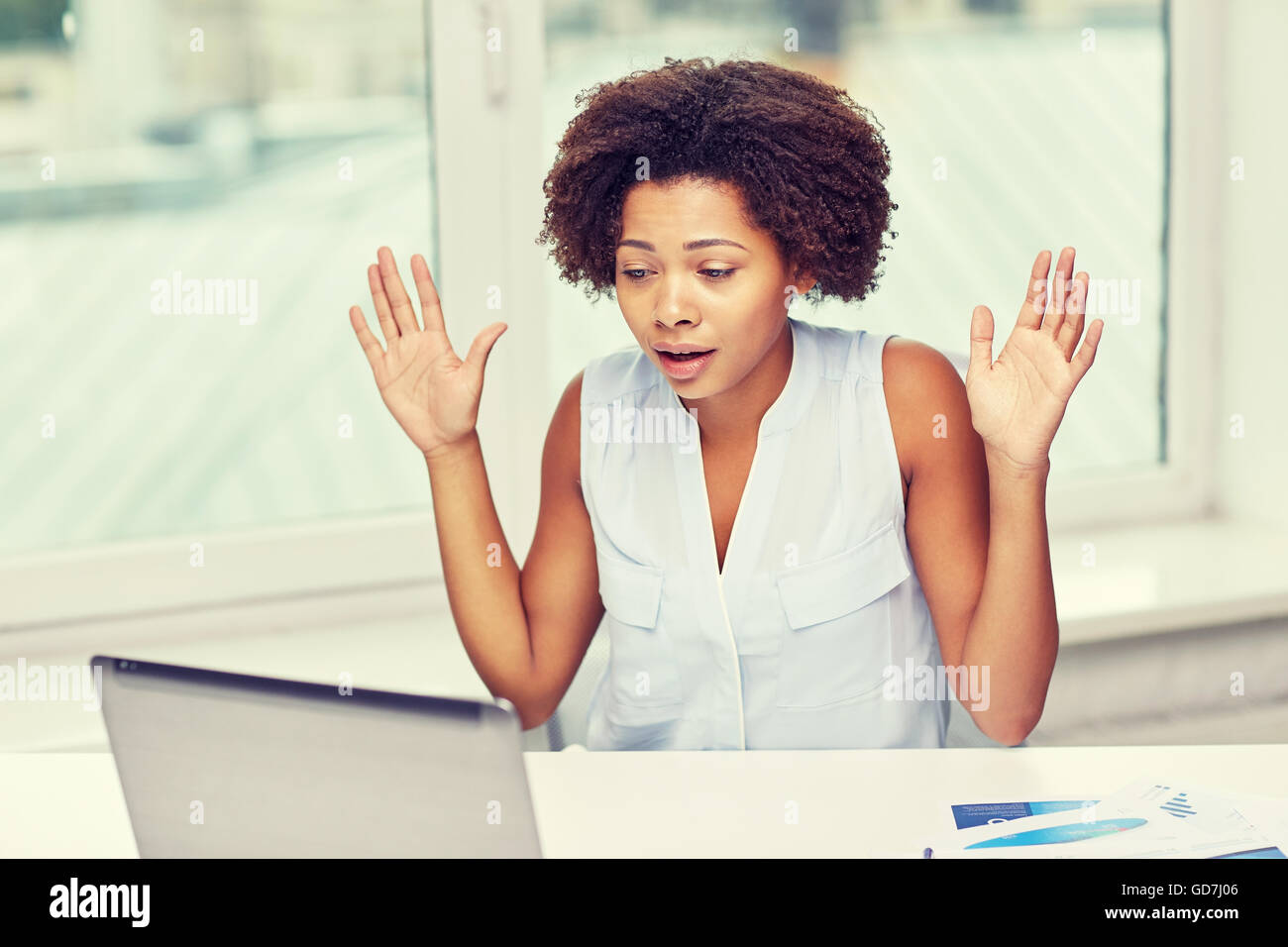 african woman with laptop at office Stock Photo - Alamy
