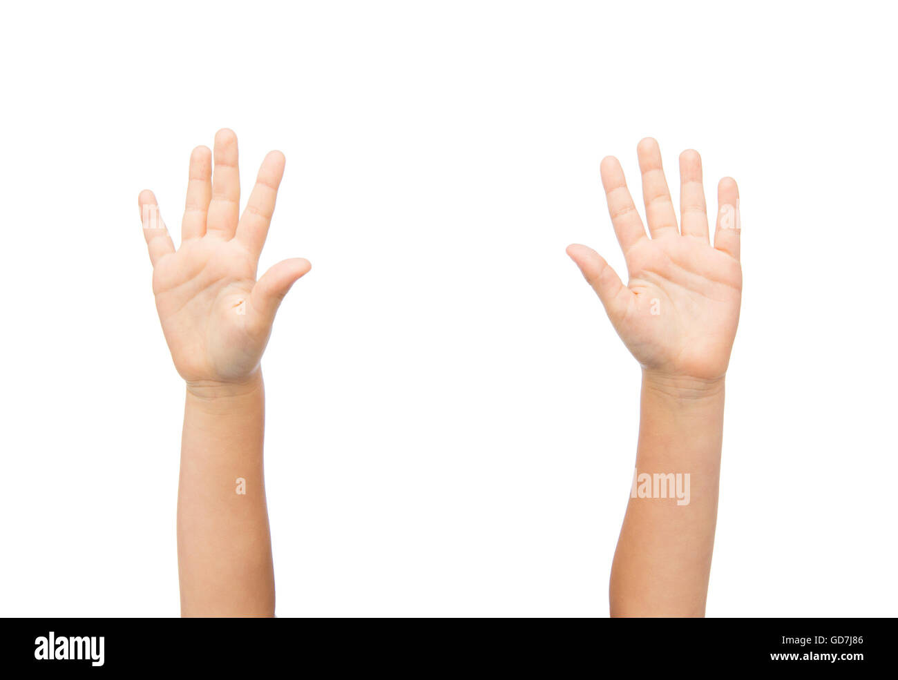 close up of little child hands raised upwards Stock Photo