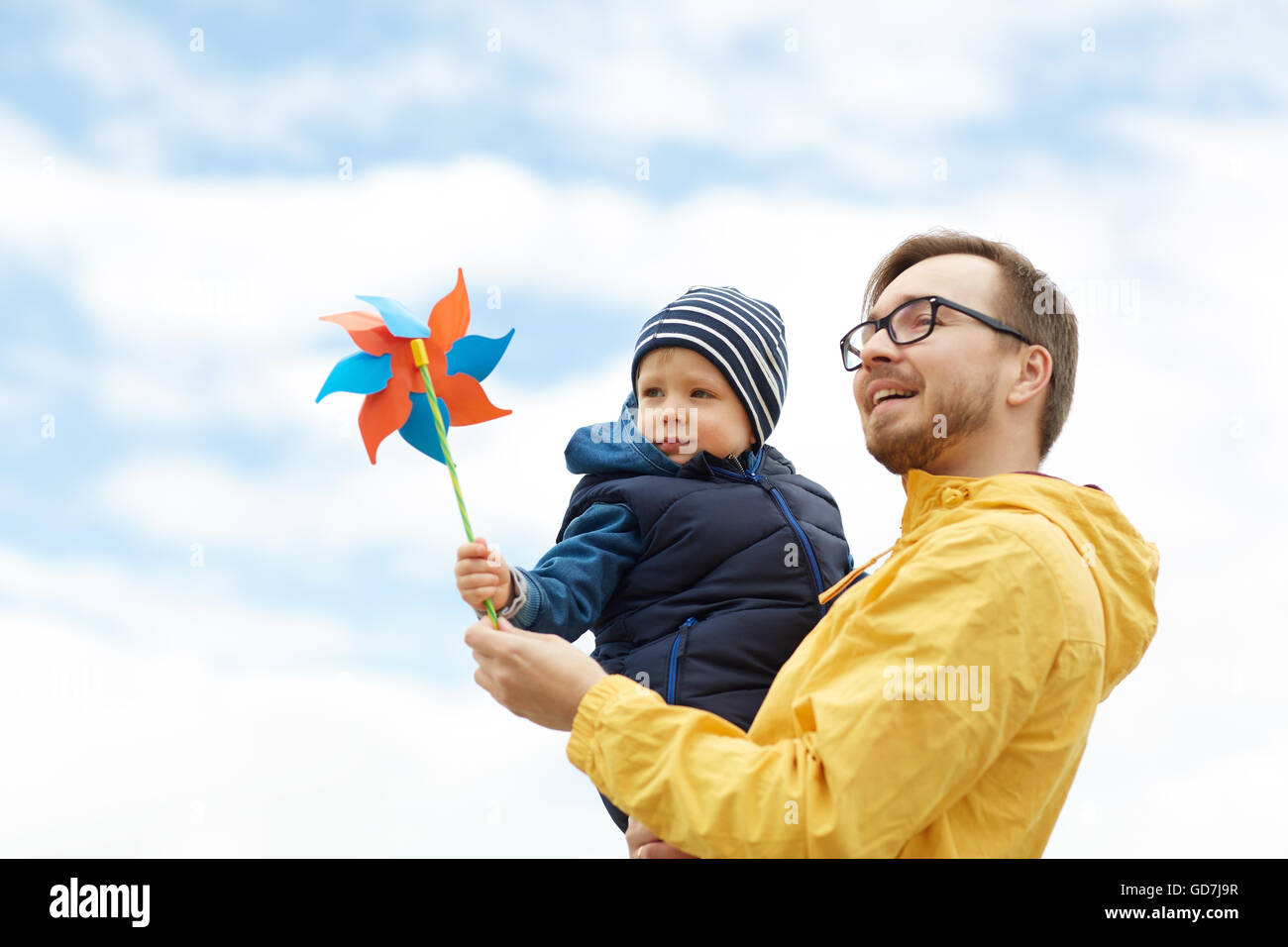 happy father and son with pinwheel toy outdoors Stock Photo - Alamy