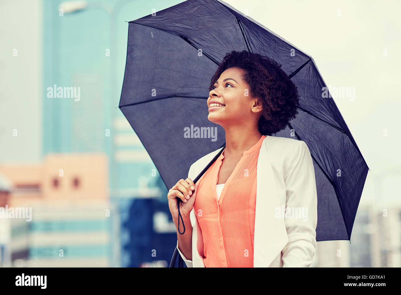 happy african american businesswoman with umbrella Stock Photo - Alamy
