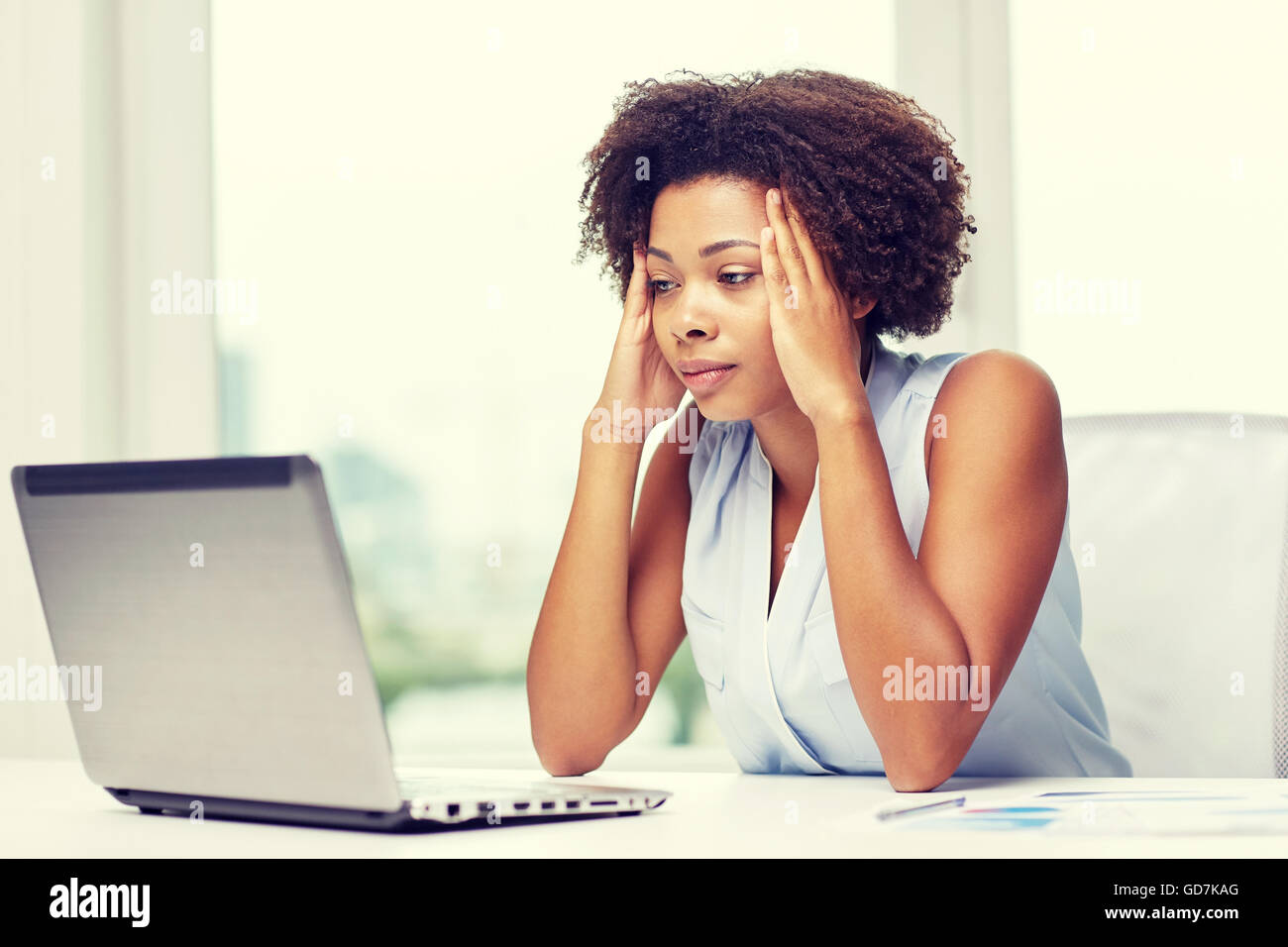african woman with laptop at office Stock Photo - Alamy