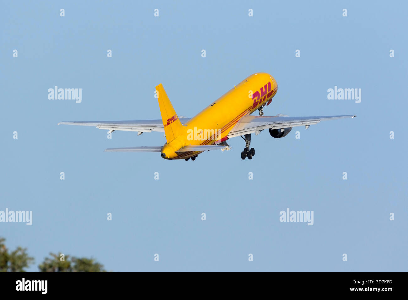 DHL Air Boeing 757-236(SF) [G-BMRE] climbing out of runway 13 heading to Pisa, Italy. Stock Photo
