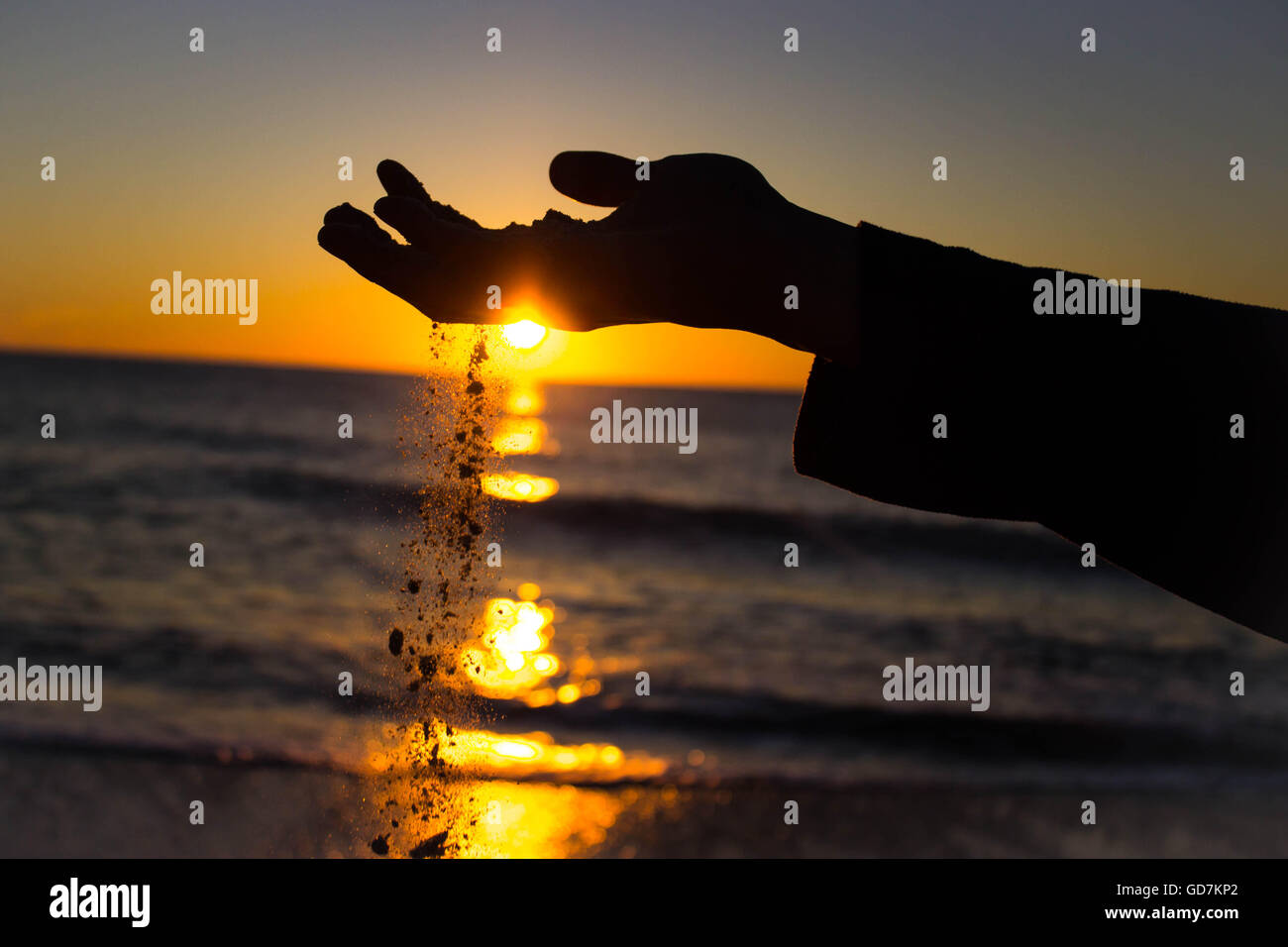 Slipping through fingers hires stock photography and images Alamy