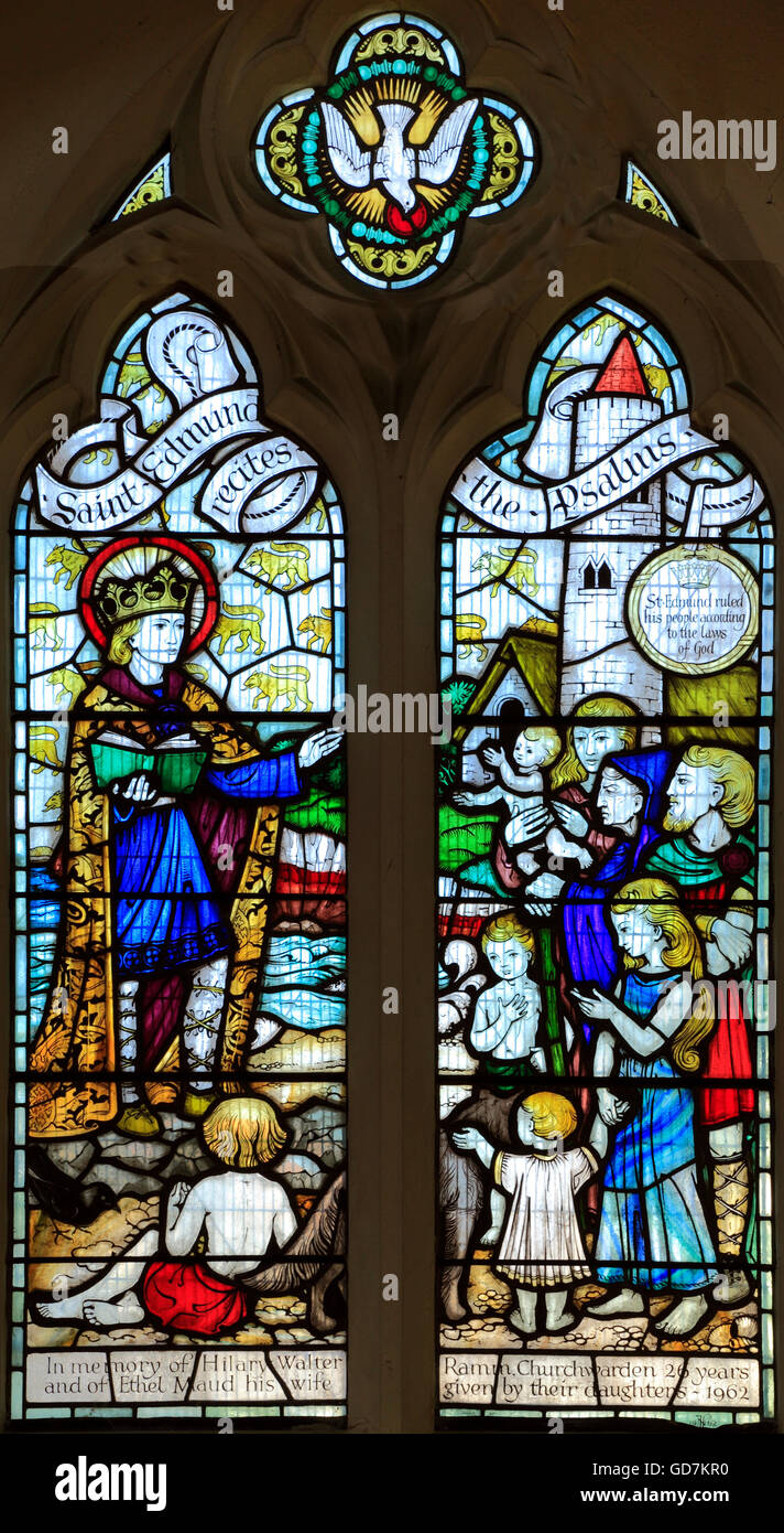 St. Edmund recites the Psalms, 20th century stained glass window, St. Edmund's Church, Hunstanton, Norfolk. England UK Stock Photo