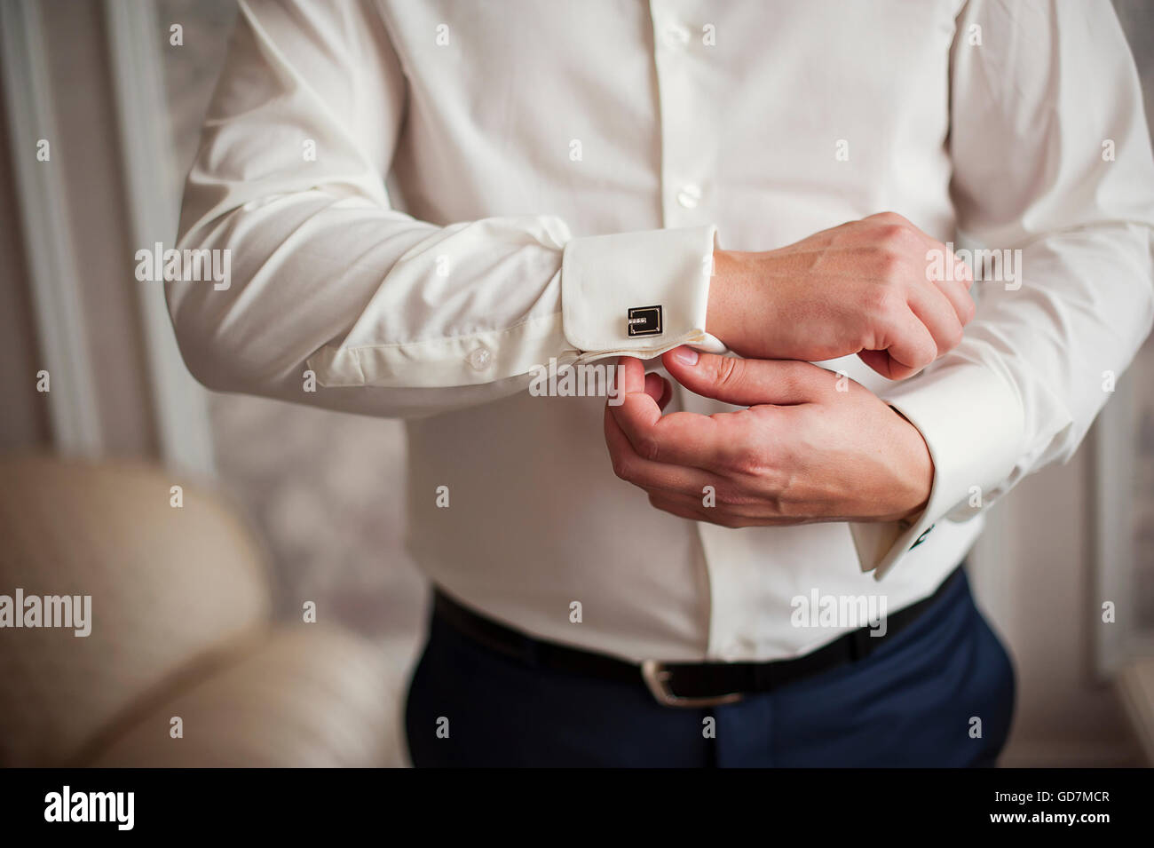 Man's style. dressing suit, shirt and cuffs Stock Photo