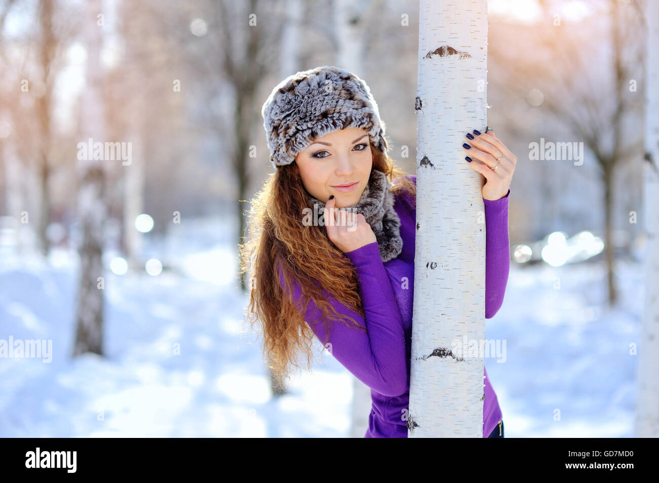 portrait of a young woman in winter park Stock Photo