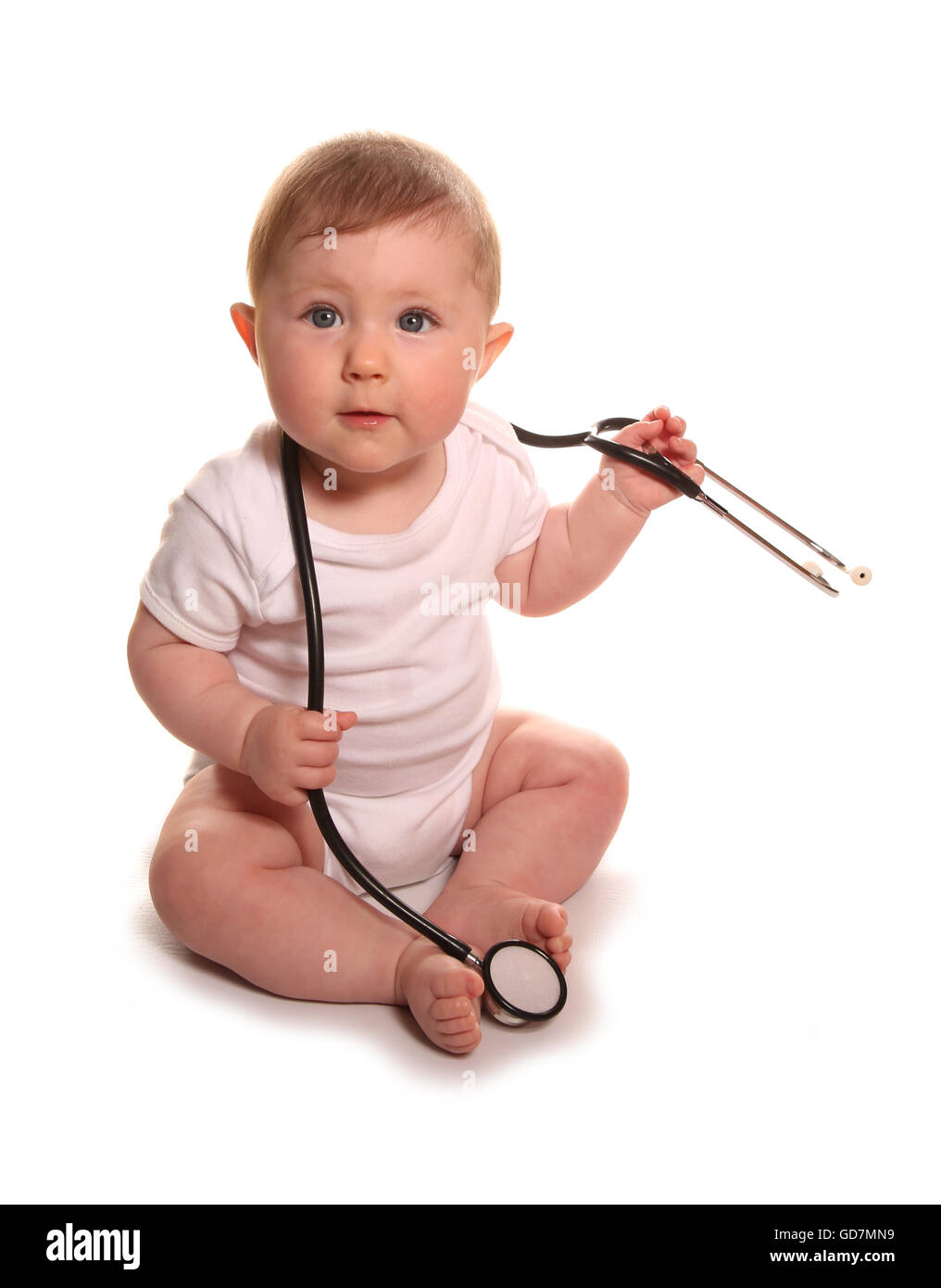 Baby girl with a stethoscope studio cutout Stock Photo