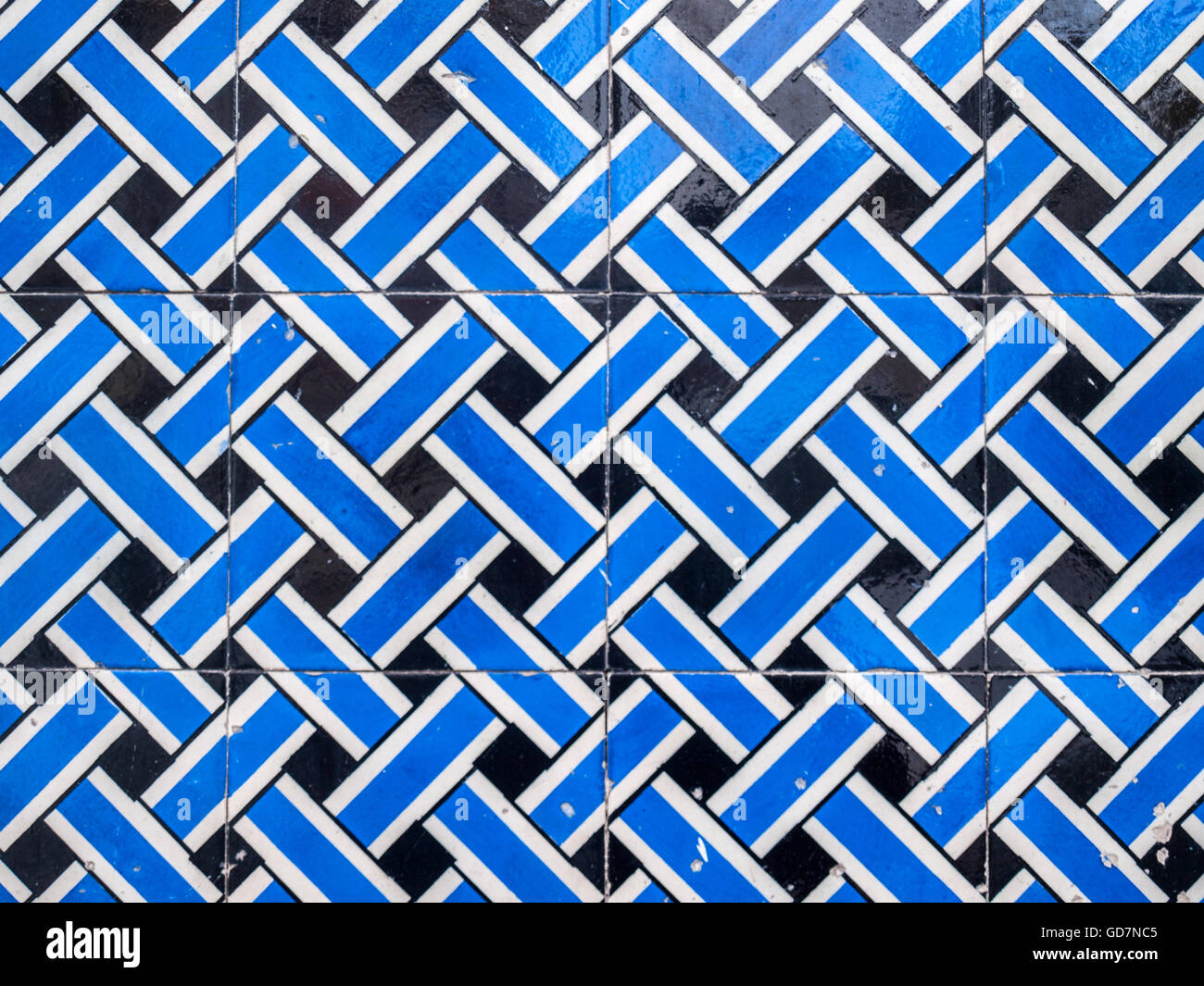 Tiles with geometric pattern in blue, white and black Stock Photo Alamy