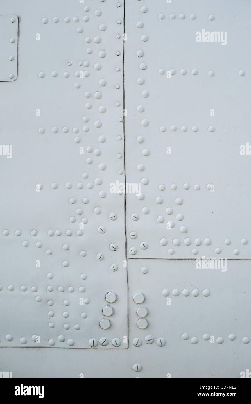 texture light skin of the aircraft with rivets Stock Photo