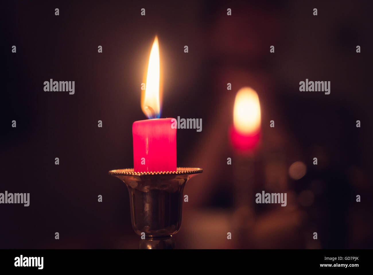 Two lit candles background Stock Photo Alamy