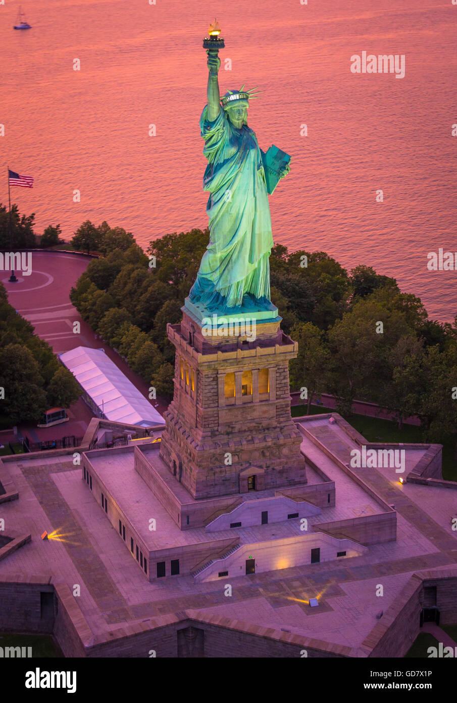 The Statue of Liberty is a colossal neoclassical sculpture on Liberty Island in New York Harbor