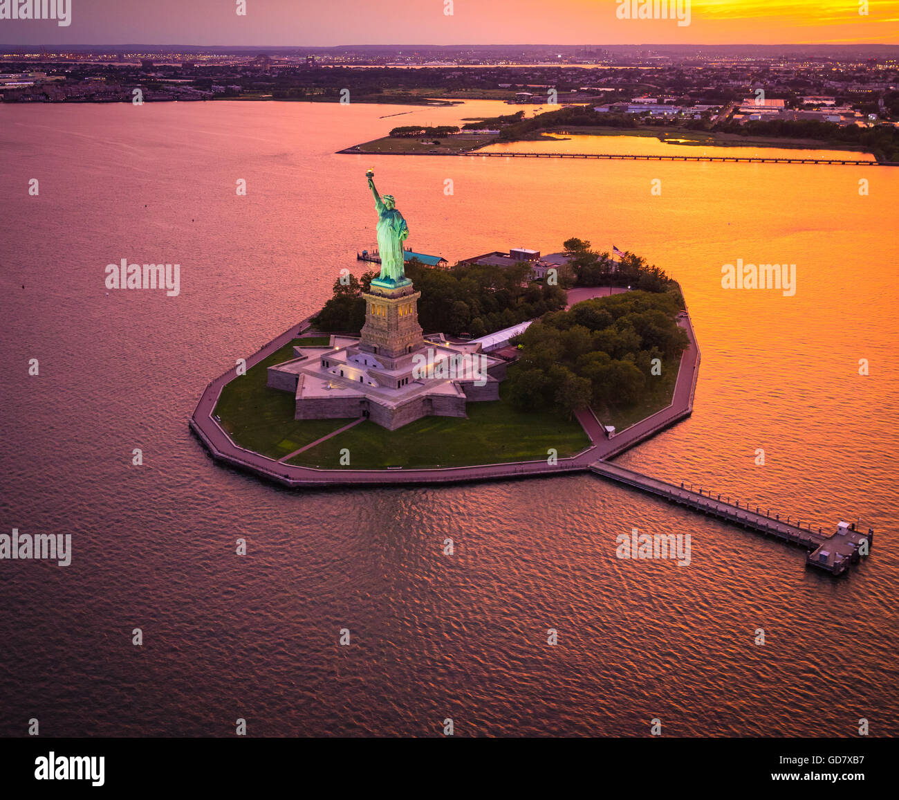 The Statue of Liberty is a colossal neoclassical sculpture on Liberty Island in New York Harbor in New York City Stock Photo