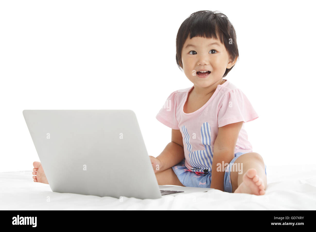 Little girl and Laptop Stock Photo - Alamy
