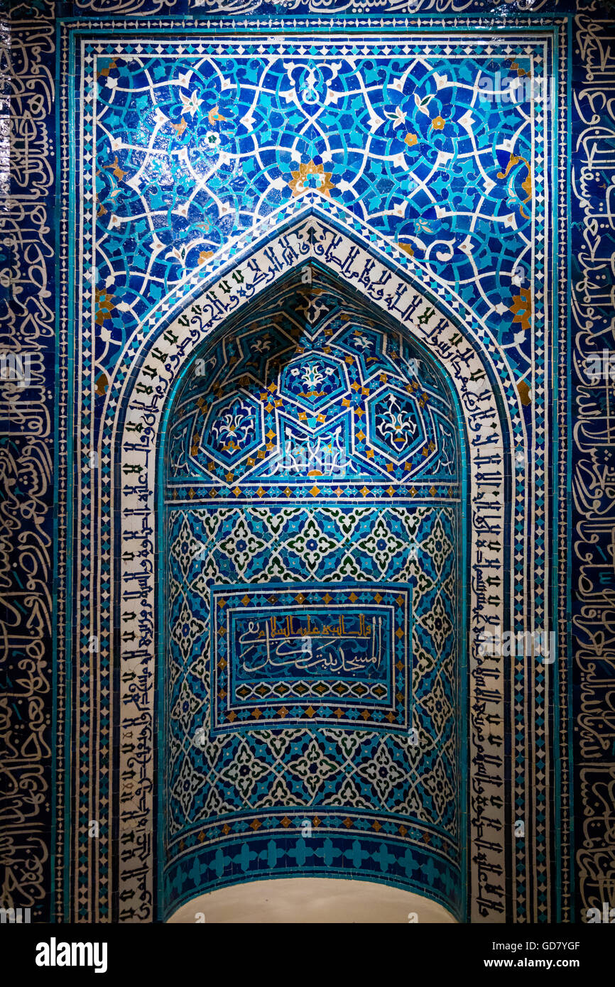 A 14th-century prayer niche, or mihrab, from a theological school in Isfahan, Iran. Stock Photo