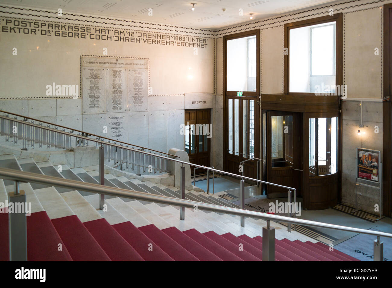 Stairs and revolving door of entrance hall of Austrian Post Office Savings Bank in Vienna, Austria Stock Photo