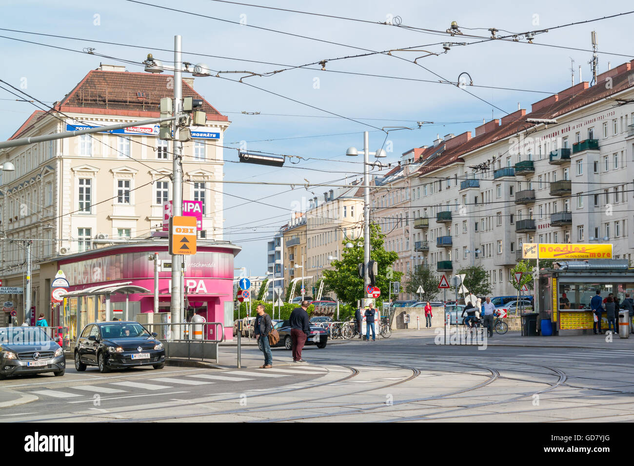 Street scene with people and traffic on Fasanplatz in Landstrasse district of Vienna, Austria Stock Photo