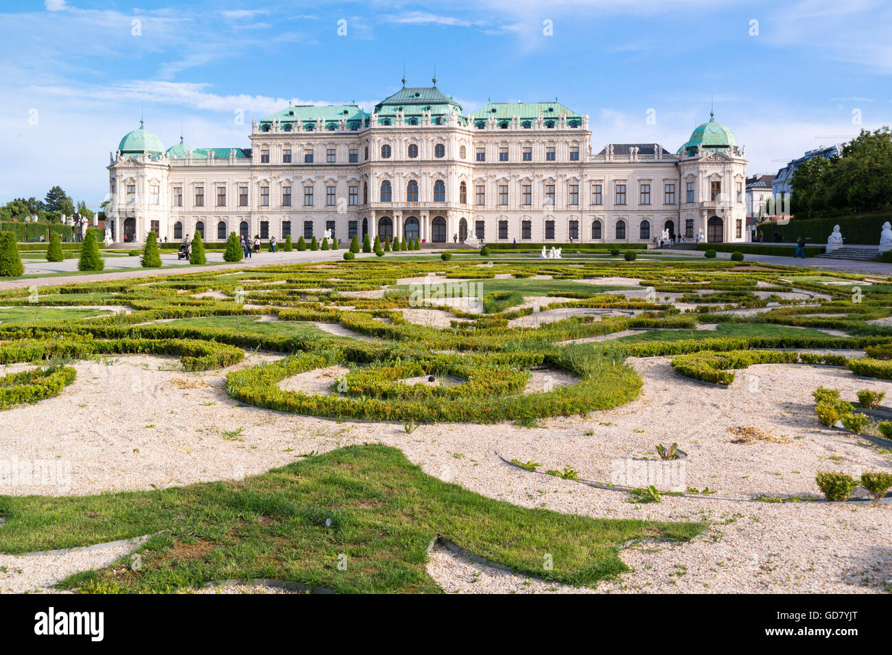 Belvedere gardens with people and Upper Belvedere Palace in Vienna, Austria Stock Photo