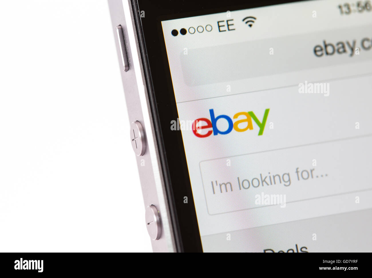 looking at ebay on an iPhone smart phone Stock Photo