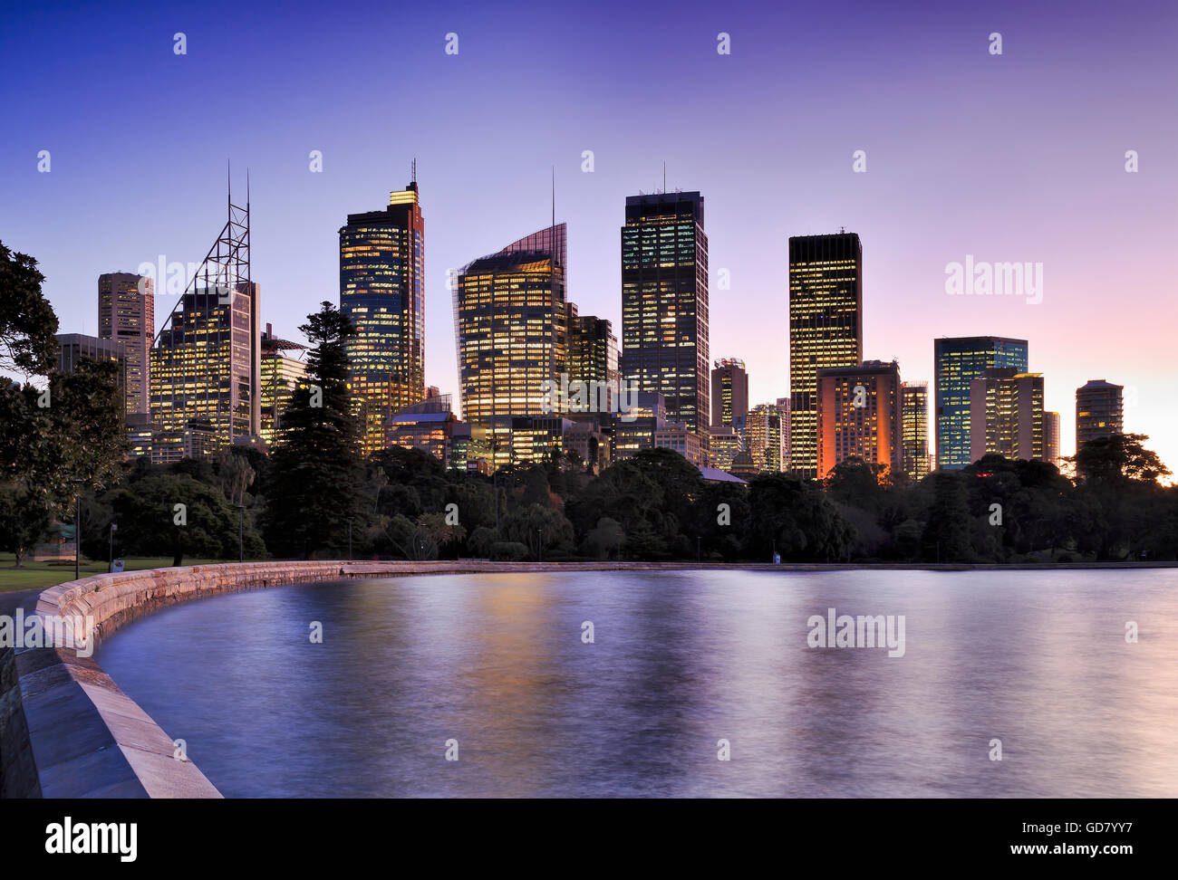 Royal botanic garden farm cove waters at sunset reflecting lights of