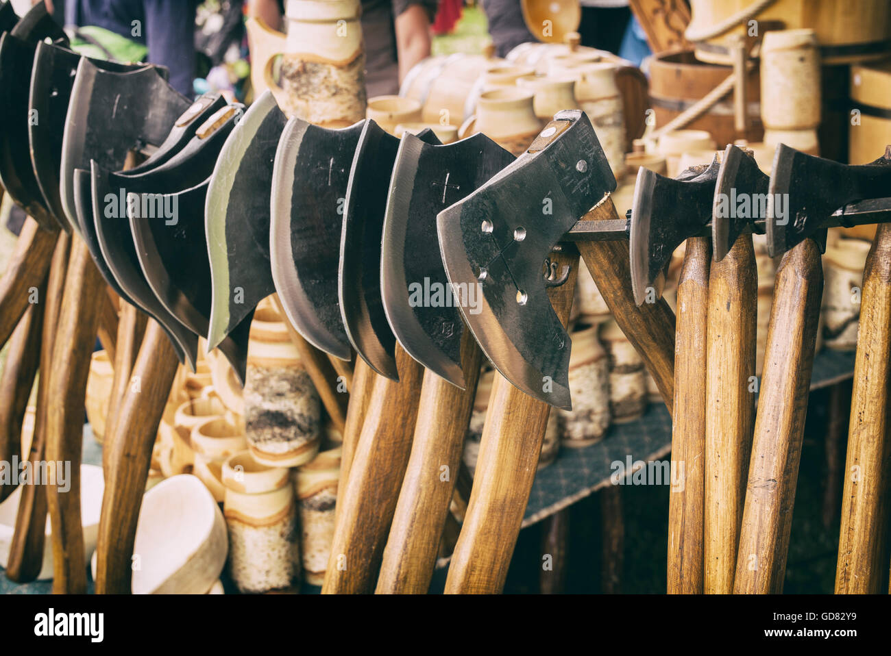 Replica medieval battle axes at the Tewkesbury medieval festival 2016, Gloucestershire, England. Vintage filter applied Stock Photo