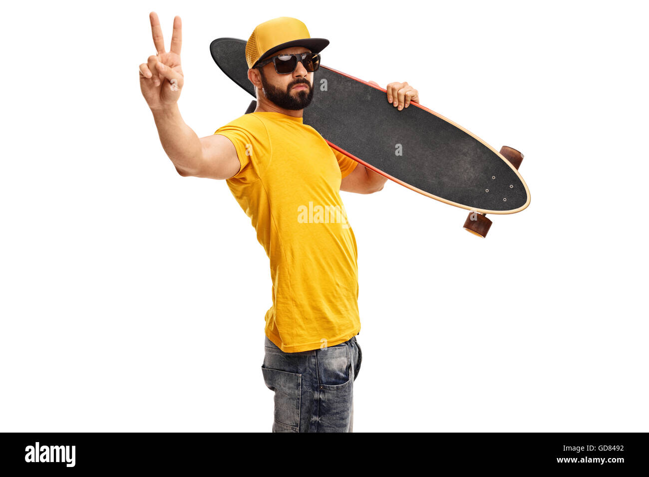 Cool skater guy holding a longboard and making a peace sign with his hand  isolated on white background Stock Photo - Alamy