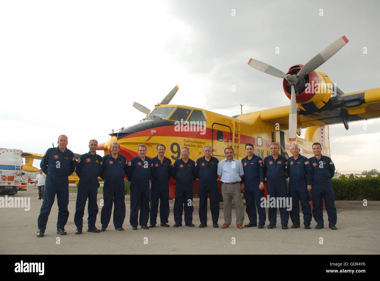 Firefighter aircraft Canadair CL-215 and maintenance crew at the Turkish Air Association-THK's Etimesgut Airport Stock Photo