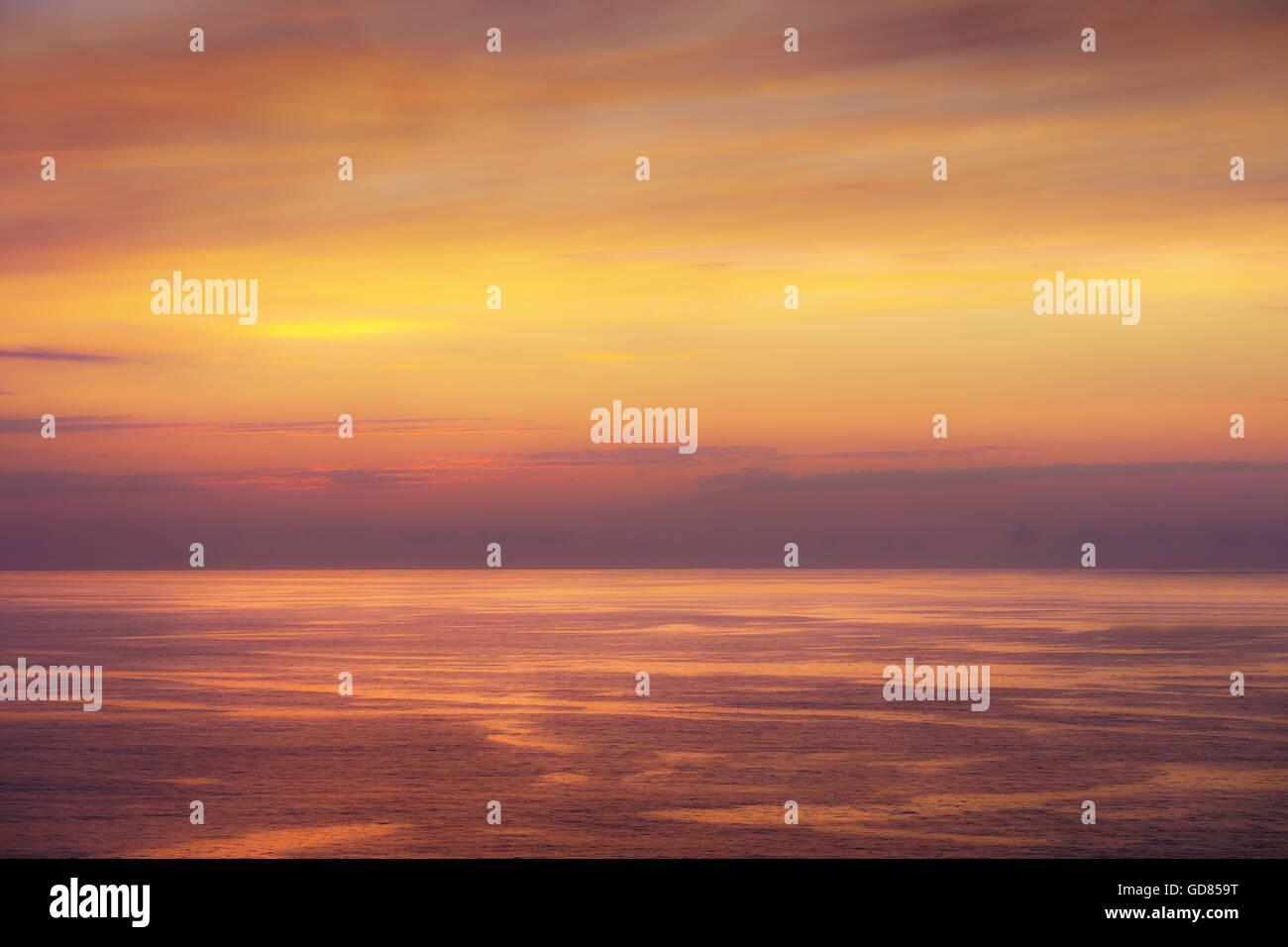 seascape with a red sunset Stock Photo - Alamy