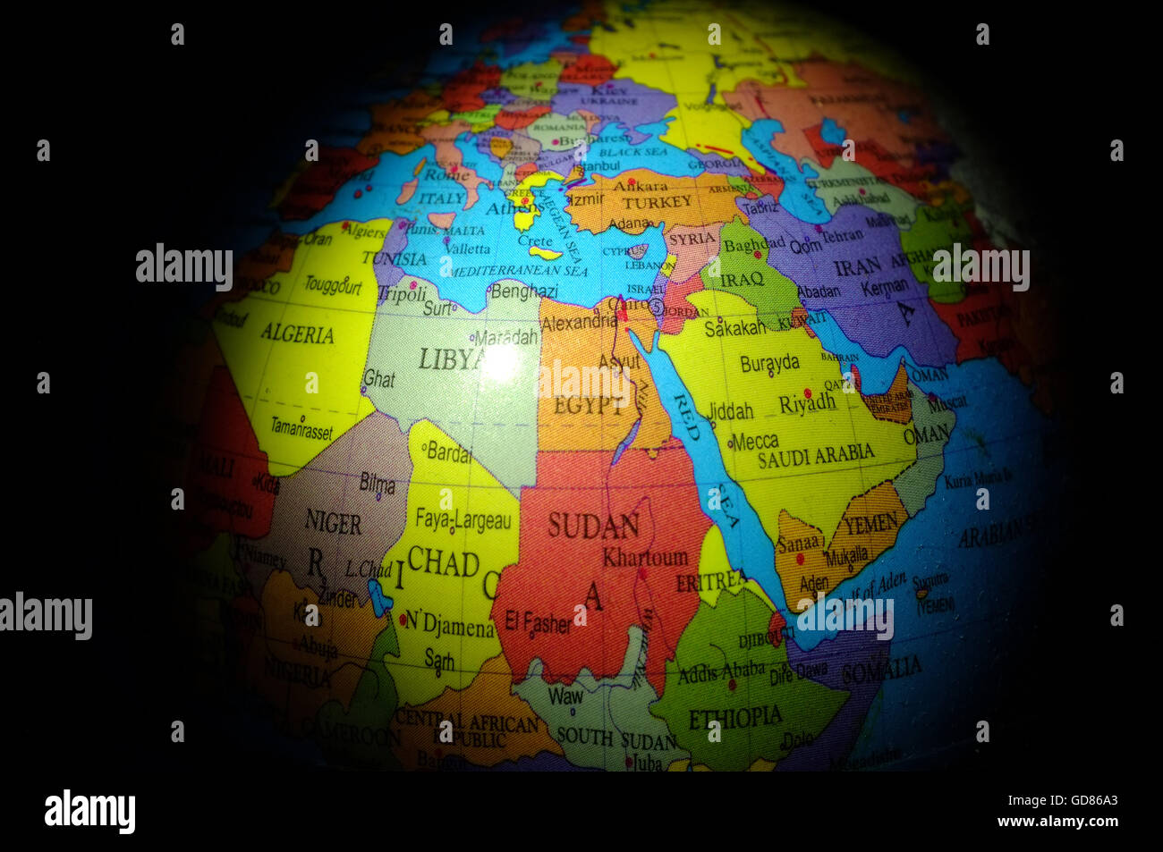 The countries of North East Africa and the Middle East highlighted on a child's globe. Stock Photo