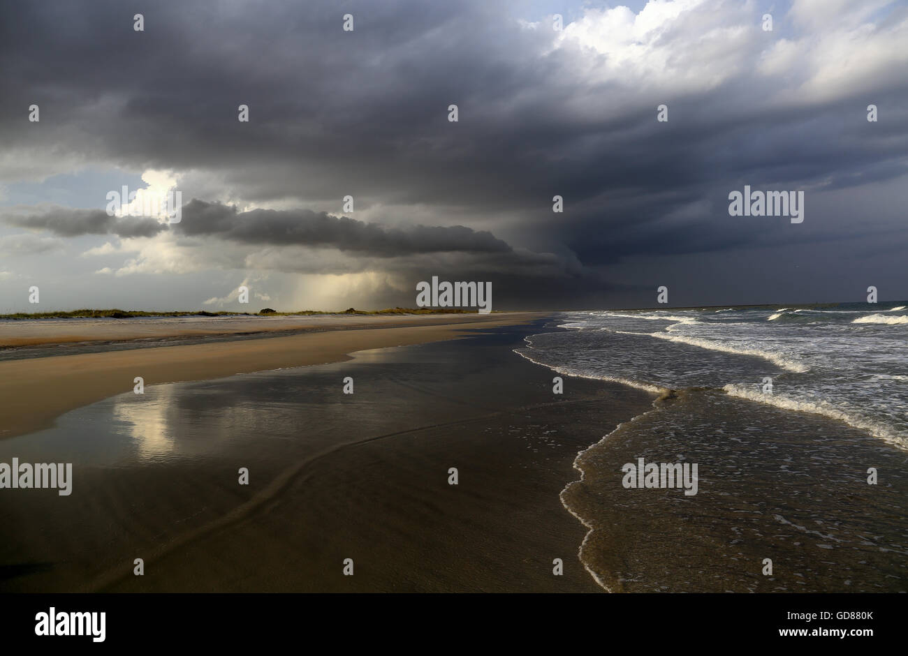 A thunderstorm rolls across a South Carolina beach. Stock Photo