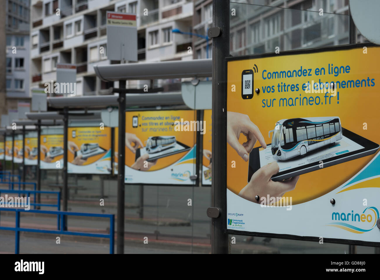 Repeated advertisement to 'subscribe online...' 'commandez en ligne...' on the bus stops at  Boulogne-sur-Mer bus station France Stock Photo