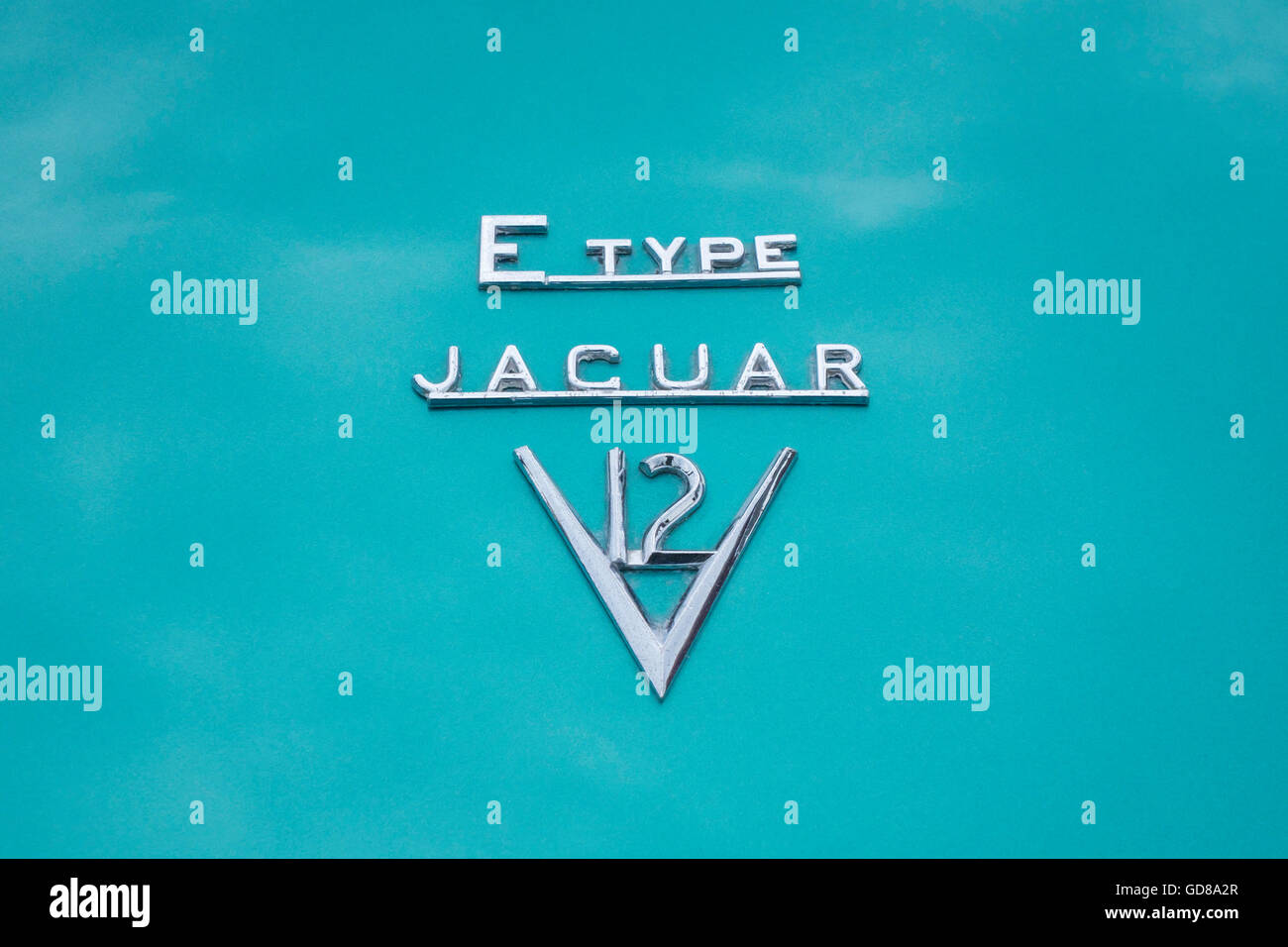 E-Type Jaguar V-12 car logo decal badge Stock Photo